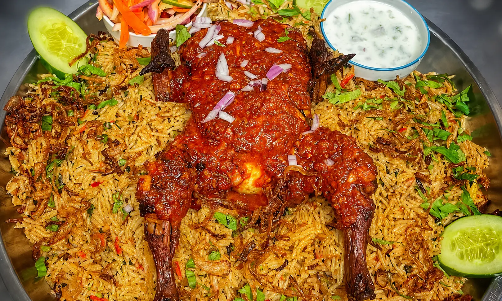Peri Peri Chicken Biryani with boiled egg at Southern Spices in Winnipeg, MB